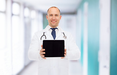 Image showing smiling male doctor with tablet pc and stethoscope