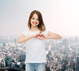 Image showing smiling little girl in white blank t-shirt