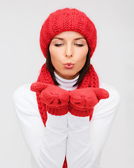 Image showing smiling young woman in winter clothes