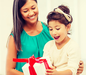 Image showing happy mother and child girl with gift box