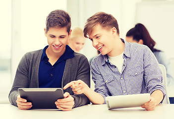 Image showing students looking at tablet pc in lecture at school