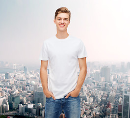 Image showing smiling young man in blank white t-shirt