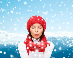 Image showing smiling young woman in winter clothes