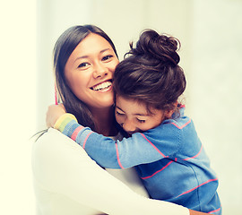 Image showing hugging mother and daughter