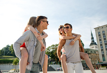 Image showing smiling couple having fun in city