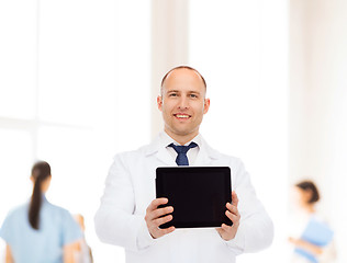 Image showing smiling male doctor with tablet pc