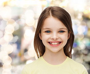 Image showing smiling little girl over white background