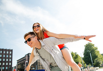 Image showing smiling couple having fun in city