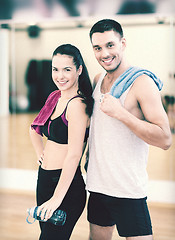 Image showing two smiling people in the gym