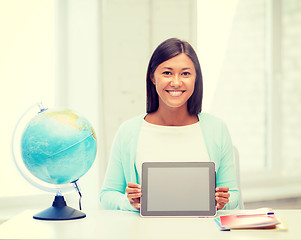 Image showing teacher with globe and tablet pc at school