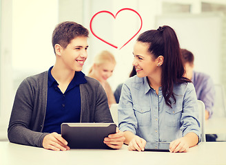 Image showing students looking at tablet pc in lecture at school