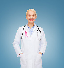 Image showing doctor with stethoscope, cancer awareness ribbon