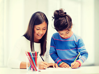 Image showing mother and daughter drawing