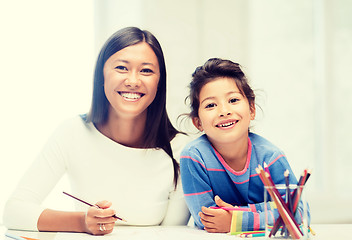 Image showing mother and daughter drawing