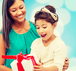 Image showing happy mother and child girl with gift box