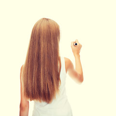 Image showing girl in blank white shirt drawing something