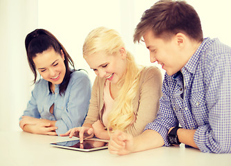 Image showing smiling students with tablet pc computer at school