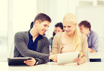 Image showing students looking at tablet pc in lecture at school