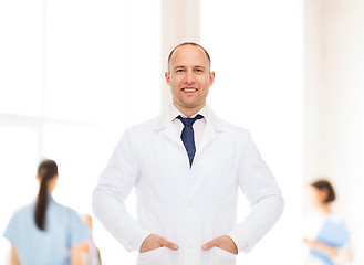 Image showing smiling male doctor in white coat