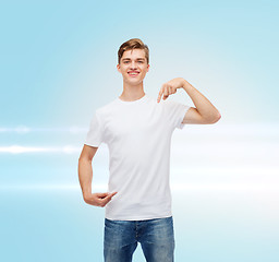 Image showing smiling young man in blank white t-shirt