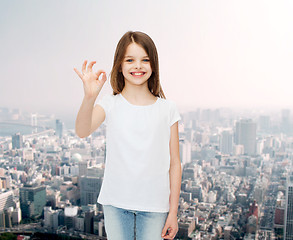 Image showing smiling little girl in white blank t-shirt