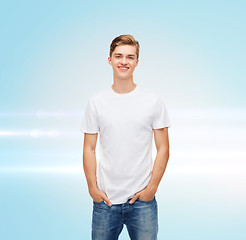 Image showing smiling young man in blank white t-shirt