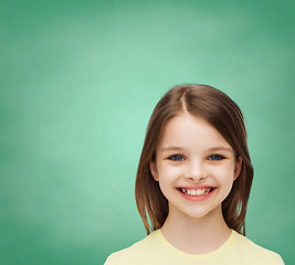 Image showing smiling little girl over white background