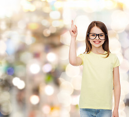 Image showing smiling cute little girl in black eyeglasses