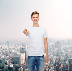 Image showing smiling young man in blank white t-shirt