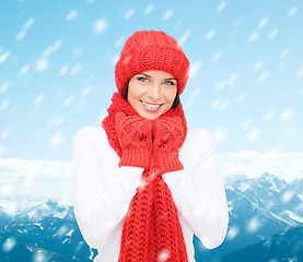 Image showing smiling young woman in winter clothes