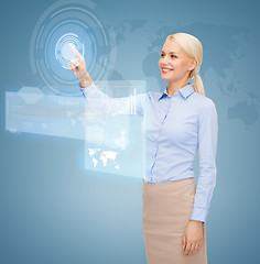 Image showing smiling businesswoman working with virtual screen