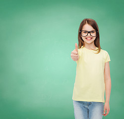 Image showing smiling cute little girl in black eyeglasses