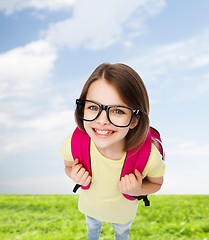 Image showing happy smiling teenage girl in eyeglasses with bag