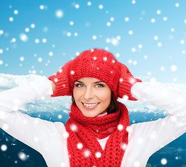 Image showing smiling young woman in winter clothes