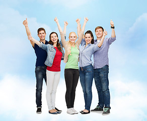 Image showing group of smiling students showing thumbs up