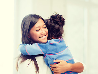 Image showing hugging mother and daughter