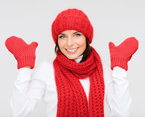 Image showing smiling young woman in winter clothes