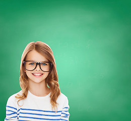 Image showing smiling cute little girl with black eyeglasses