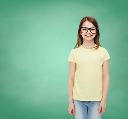 Image showing smiling cute little girl in black eyeglasses