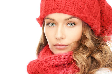 Image showing close up of smiling young woman in winter clothes