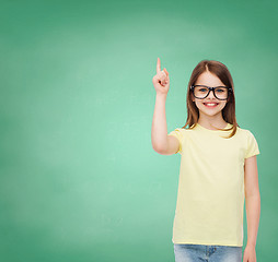 Image showing smiling cute little girl in black eyeglasses