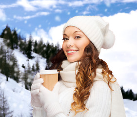 Image showing woman in hat with takeaway tea or coffee cup