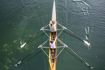 Image showing Two boys in a boat