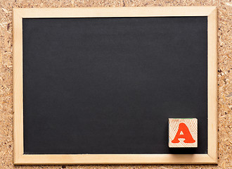 Image showing Chalkboard with block