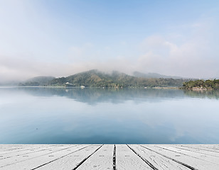 Image showing Lake with mist and cloud