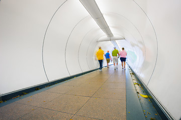 Image showing People go through underpass. Abstract photo from the center of S