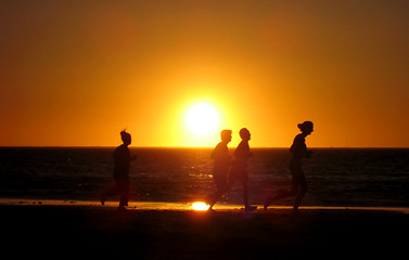 Image showing Running in the sunset