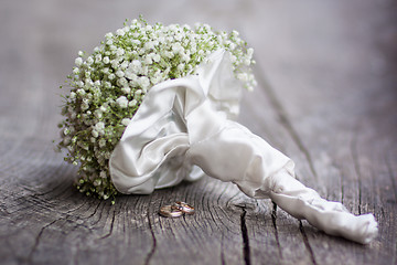 Image showing Wedding bouquet and rings.