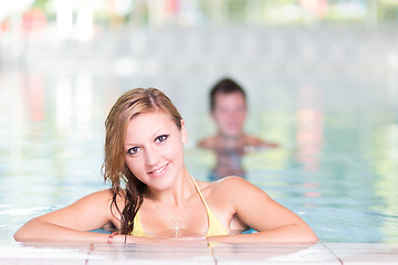 Image showing Young woman in the swimming pool.