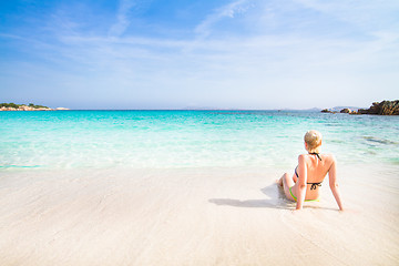 Image showing woman relaxing on the beach.